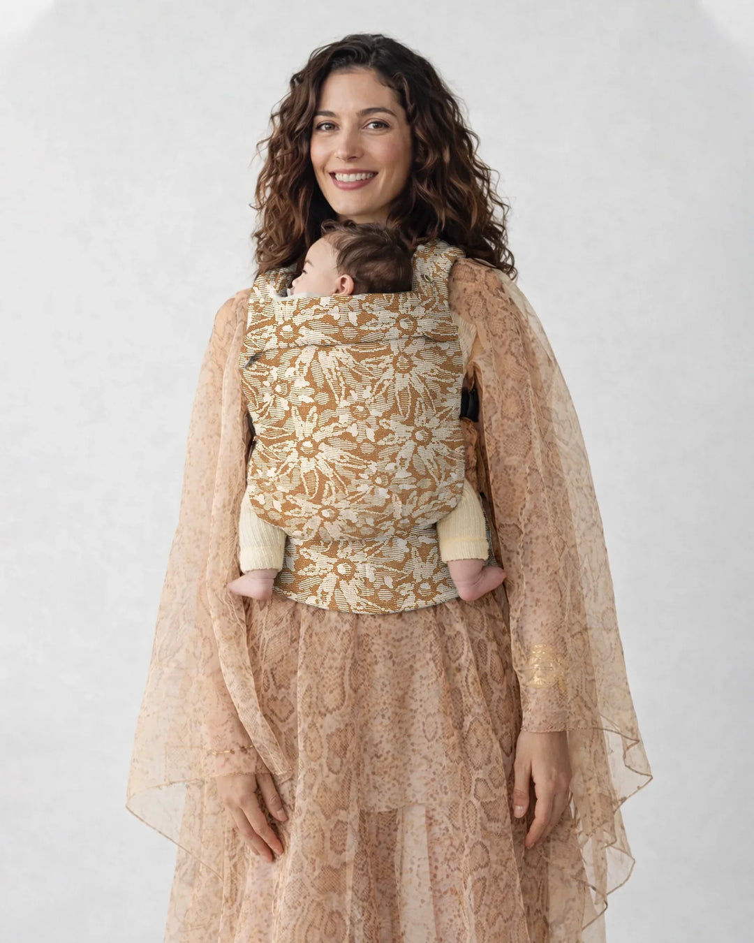 Babytrage „Warmer Sand“ mit Blumenmuster